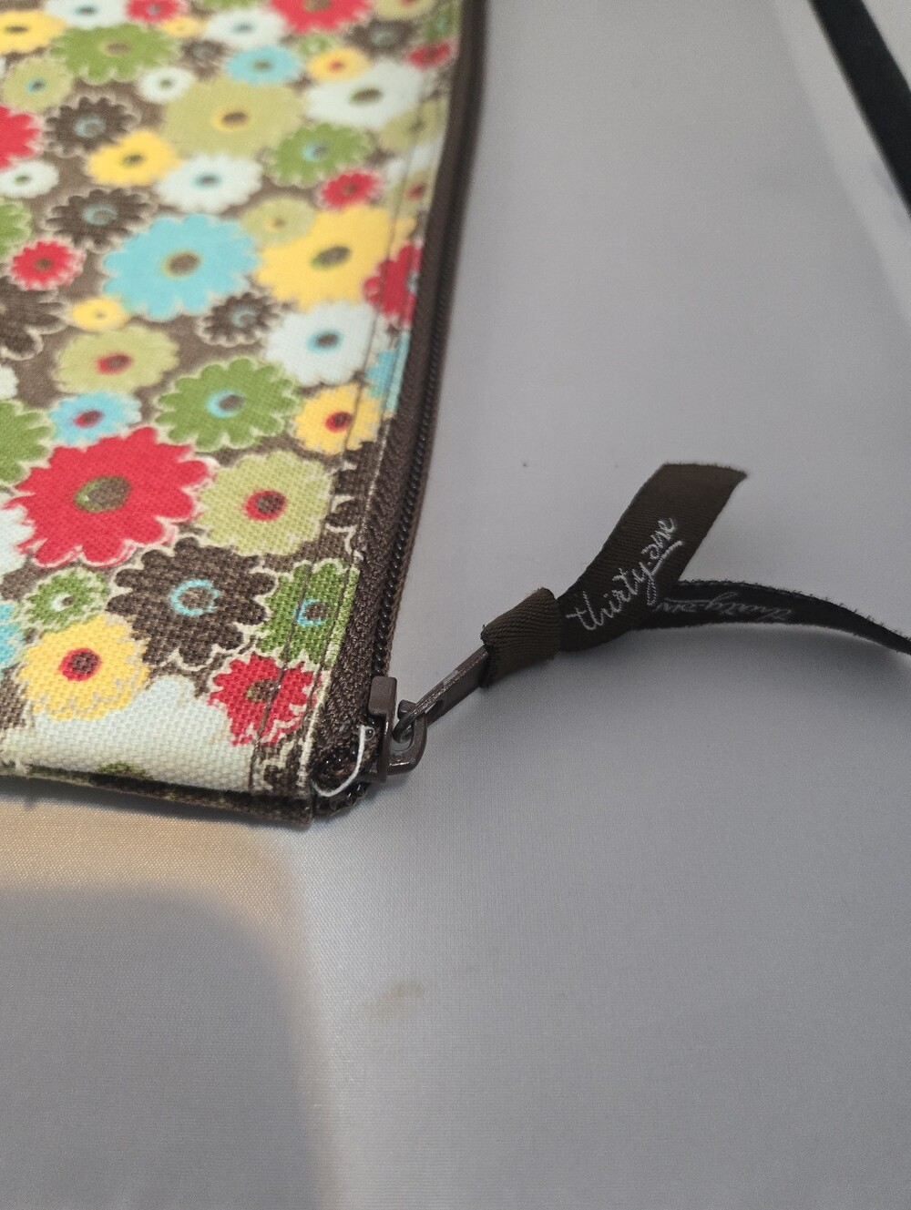 Thirty-One Gifts zipper pouch featuring a "Windsor Bouquet" floral pattern. - Picture 2 of 7